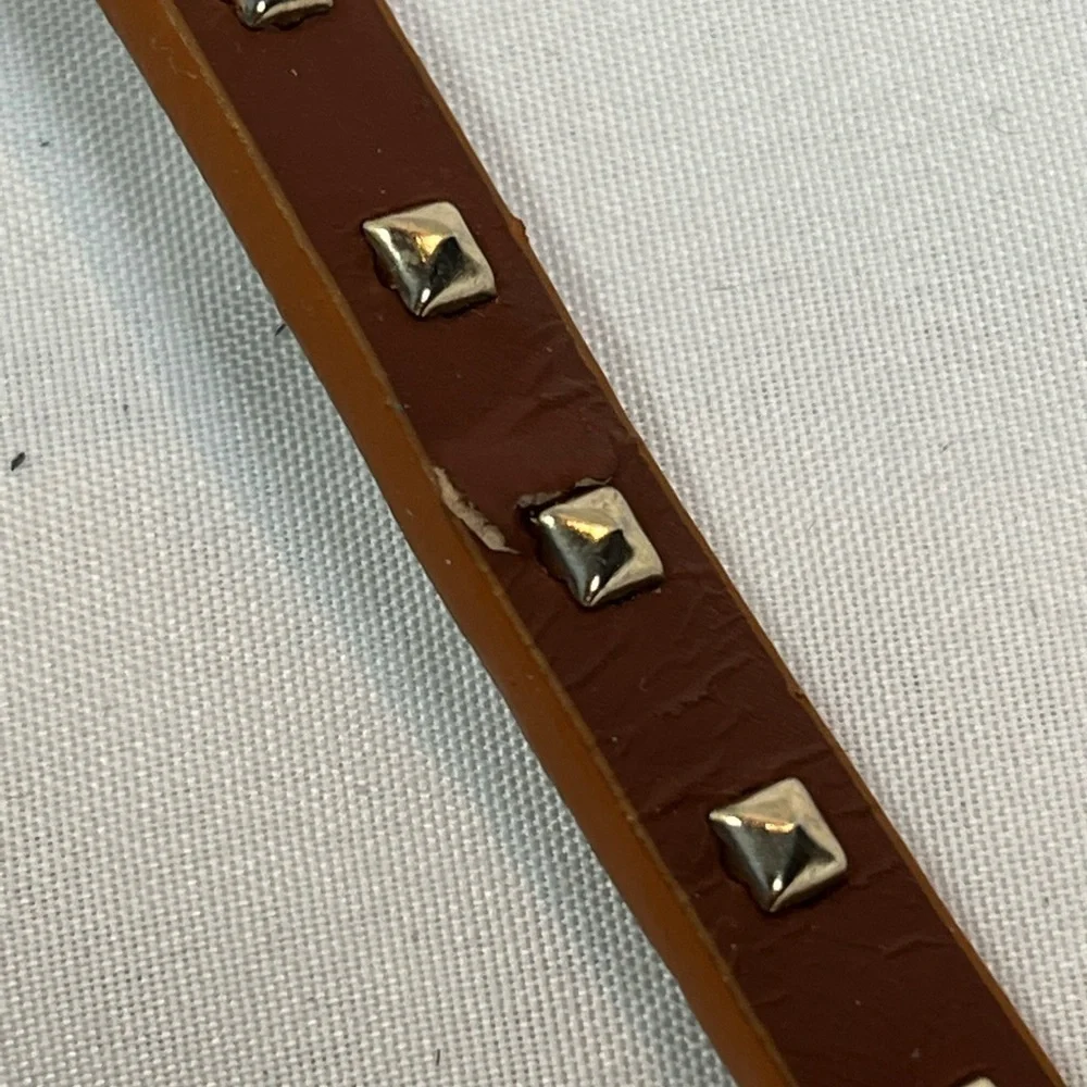 Thin brown belt with gold buckle & embellishments